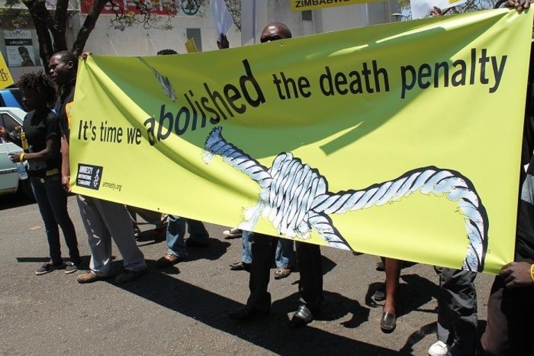 Amnesty International Zimbabwe activists march through the capital Harare to peacefully protest against the death penalty on World Day Against the Death Penalty. Events took place in the city that day including a rally under the title - Time to abolish the death penalty in Zimbabwe. Justice minister Emerson Mnangagwa spoke at the rally. Death Penalty Day that falls on October 10 every year, is meant to encourage states to adopt the principle that ‘the use of the death penalty undermines human dignity’.