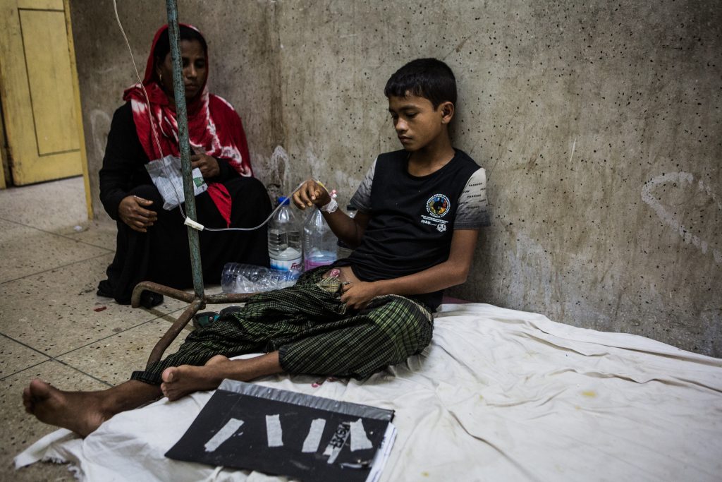 Mohamed Ismail, 14, receives treatment at Cox's Bazaar District Sadar Hospital in Bangladesh, 1 October 2017. He said he was shot by Myanmar soldiers when they surrounded his village in northern Rakhine State around one month earlier.