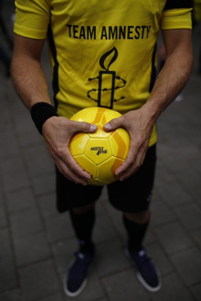 A team of 11 Amnesty activists dressed in soccer outfits kicked 100 balls over the fence of the Russian Embassy in Brussels. The human rights activists asked for the release of prominent HRD Oyub Titiev and for the protection and recognition of all other Russian HRDs