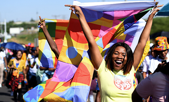 Members and supporters of the lesbian, gay, bisexual, transgender (LGBT) take part in the first Botswana Pride Parade in Gaborone, on November 30, 2019. - The parade aiming to achieve greater tolerance and inclusion of all African LGBTQ+ identities is the first one organised in Botswana, after the Court ruled on June 11 in favour of decriminalising homosexuality, which had been punishable by a jail term of up to seven years. (Photo by Monirul Bhuiyan / AFP) (Photo by MONIRUL BHUIYAN/AFP via Getty Images)