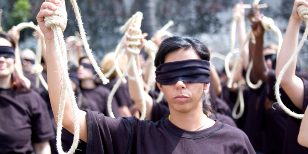 Death Penalty action at Amnesty International's International Council Meeting, Mexico, 15 August 2007. 71 AI delegates took part in the action; at least 71 children and young adults are in prison in Iran awaiting execution.
